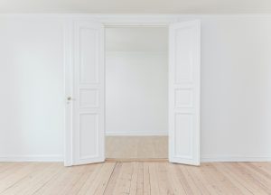 Boyne Island Real Estate - open white doors